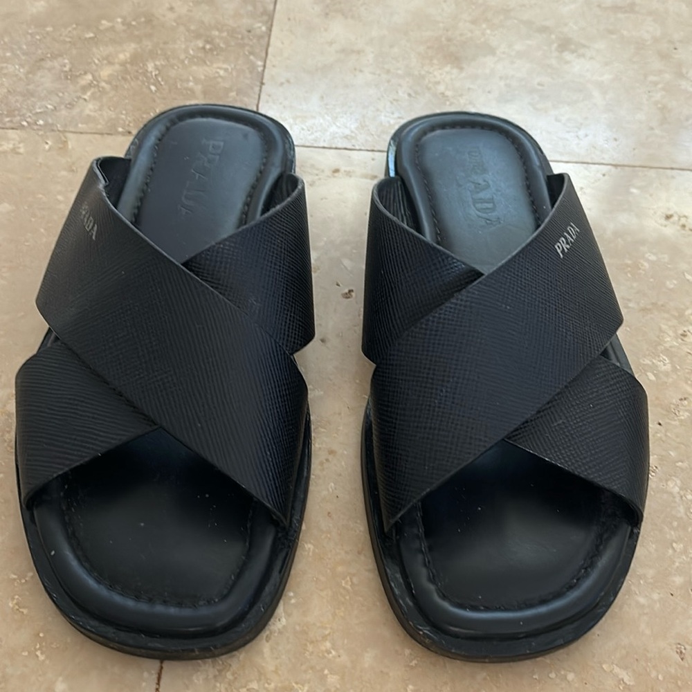 Prada men’s black leather slides criss cross
